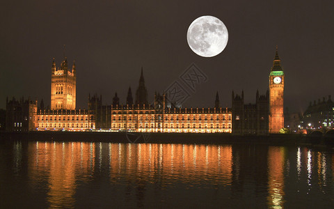伦敦威斯敏特王宫之夜满月环顾国会的图片
