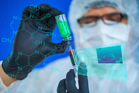 未来医学医疗护理一名携带注射器的微生物学家医生从测试管中提取DNA图片