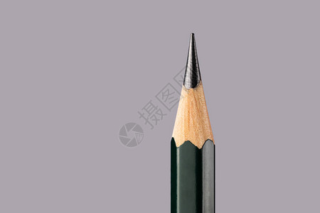 灰色背景上的石墨铅笔特写绘图教学校文具材料的概念极简主义图片