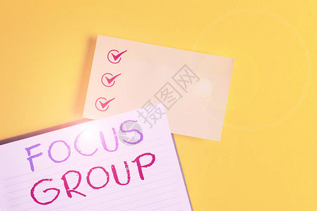 概念手写显示焦点小组概念意义显示组装参与讨论黄桌上有复制图片