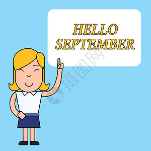 写笔记显示你好九月热切希望热烈欢迎9月女站立的商业概念背景图片