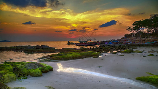 日落海船地平线景观海沙滩场景图片