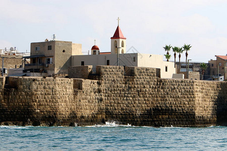 以色列北部地中海沿岸阿克里市的古代十字军堡垒背景图片