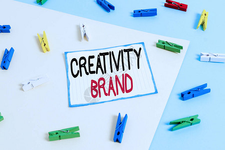 概念手写显示创意品牌概念意义设计名称或区分组织的特征黄蓝背景彩图片