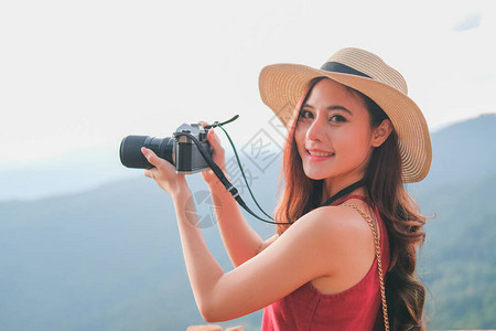 亚洲女人拍照旅行者旅游度假旅行图片