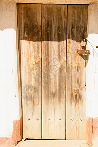 古老的木门塞在一背景图片