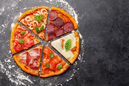 香肠西红柿芝士和海鲜等不同披萨的美味切片图片