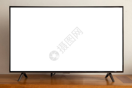 空白屏幕引导的电视机在木板前背景图片