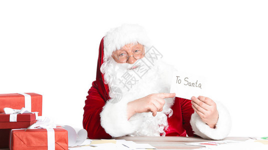 圣诞老人在白背景的桌图片