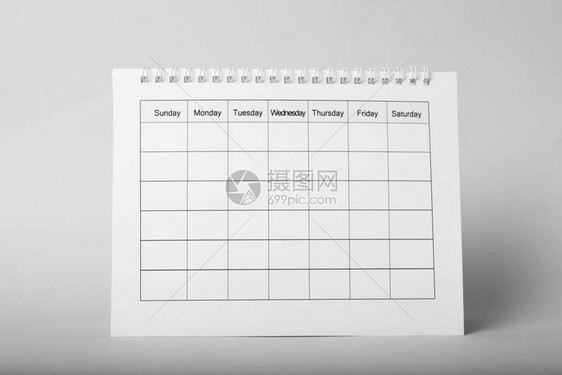 关于灰色背景的空白纸页日历图片