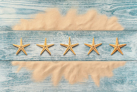 暑假五星服务概念木底海星的高角图片
