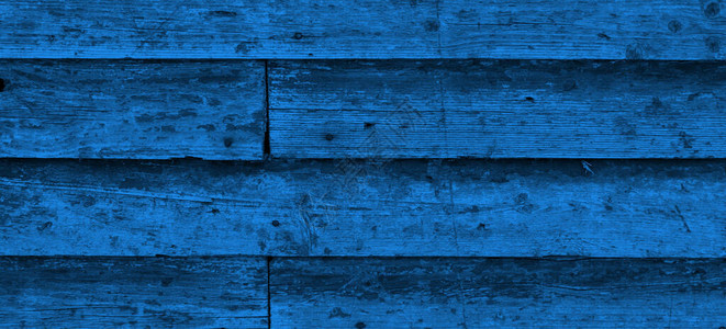 经典蓝色木板的纹理Grunge背景老木经典的蓝色木质表面图片