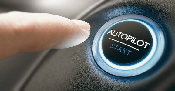手指按下自动驾驶汽车中的自动驾驶按钮手摄影和3D背景之图片