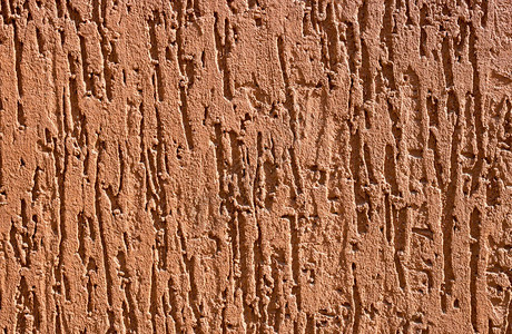 棕色装饰松软石膏stucco墙壁图片