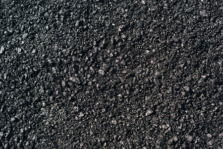 黑色花岗岩砾石背景图片