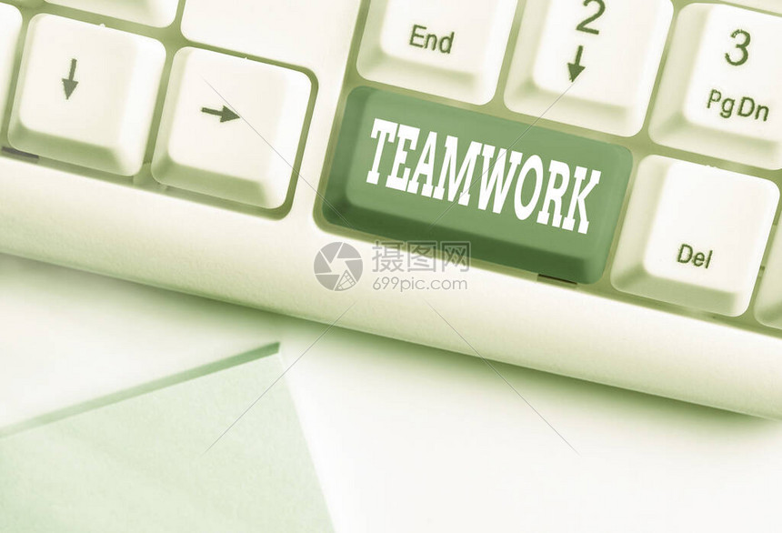概念手写显示团队合作概念意味着组s是协作努力实现一个共同目标白色pc键盘图片