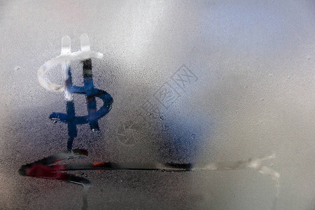 迷雾玻璃上的美元符号和雨滴箭头是如图片