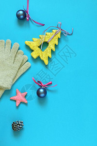 圣诞背景新年玩具围巾蓝纸手套图片
