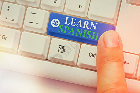显示学习西班牙语的书写笔记培训写作和说西班牙国图片