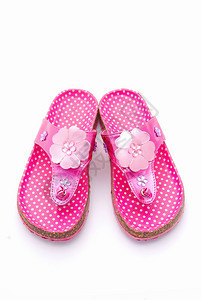 一对时髦的粉红色小夏凉鞋背景图片