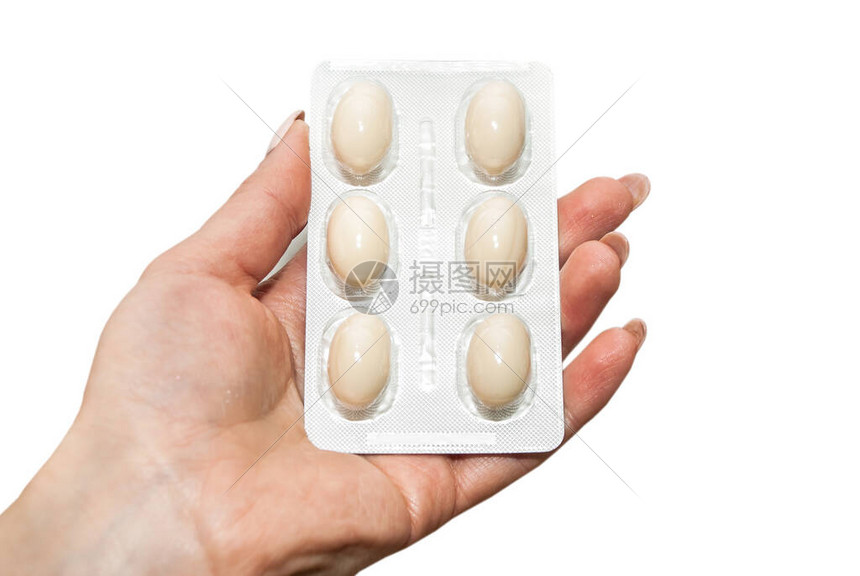 手拿着泡罩包装中的药丸高清图片下载-正版图片504091154-摄图网