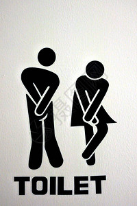 在公共厕所的入口处为男女提供急症高清图片