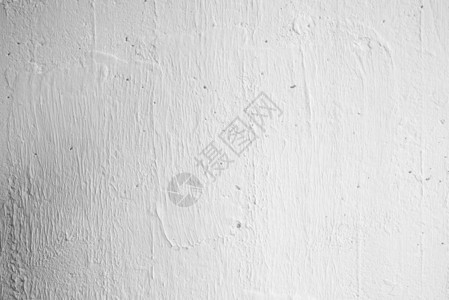 白色石膏灰泥墙纹理背景与来自右侧的光束图片
