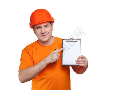 肖像微笑的中年英俊工人戴着橙色硬帽图片