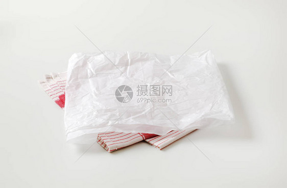 茶巾上的白色蜡纸屠夫纸折痕图片