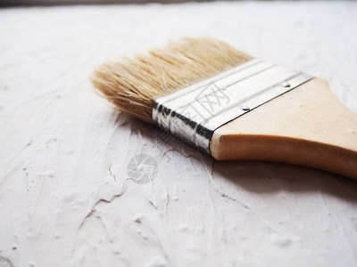 绘画工作的工具抹刀和刷子一套维修项目用刷子和抹刀在木头上涂抹腻子的生成器的顶视图广告文字的可用空间正品照片图片
