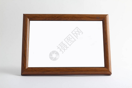 白色木背景上用于绘画图片或文字的空木框架背景图片