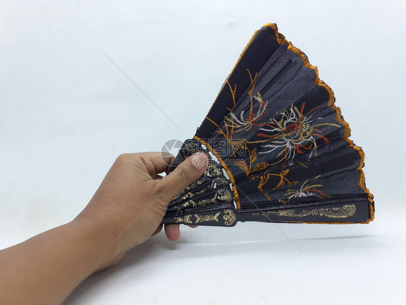 木制竹丝折扇中式日本复古风格手工彩色蜡染图案手扇带织物袖子和流苏家居装饰派对婚图片素材-正版创意图片504138240-摄图网