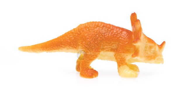 由塑料制成的三角式天体恐龙玩具在白色图片