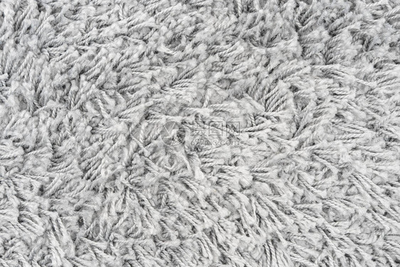 白色天然毛绒地毯纹理背景Wool图片