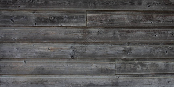 由木板制成的墙特写被风化的灰色木材图片