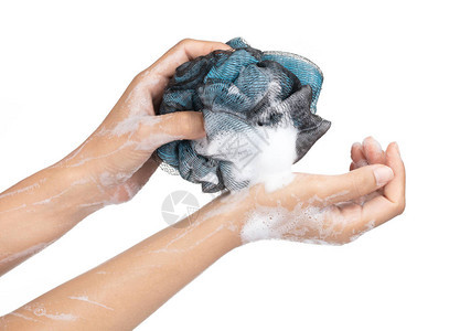用肥皂和海绵洗手将白图片