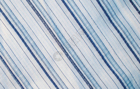 白色棉质材料带有可见纹理的蓝色条纹图片