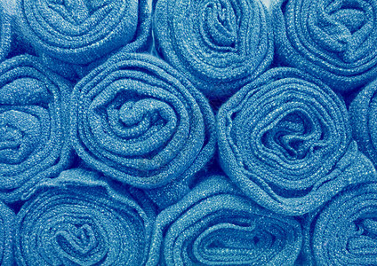 堆积的蓝色彩毯子用图片
