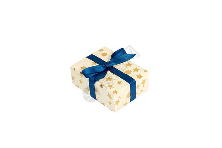 圣诞节或其他节日手工制作的礼物在金纸与蓝丝带图片