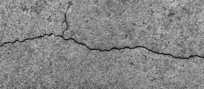 有裂缝背景纹理的旧混凝土石膏墙图片素材