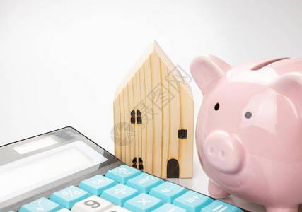 小猪银行计算家庭贷款储蓄金融规划概念白种背图片