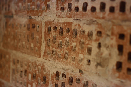 具有小洞的红砖墙背景Vintage砖条纹全网横幅或带有复图片
