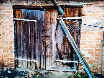 老旧的谷仓门木制门背景图片