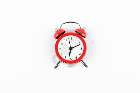 白色背景上的红色复古闹钟孤立的白色背景上的圆形红色闹钟标准计时器概念图片