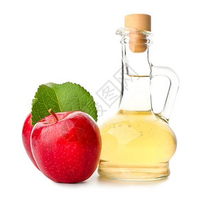 白色背景中的一瓶苹果醋图片