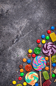 彩色糖果和棒糖的组背景图片