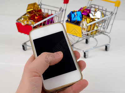 特别的圣诞节在手机屏幕上提供折扣短信有关季节生锈背景的信息钱卡包背景图片