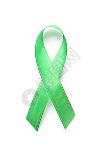 白色背景上的绿丝带癌症意识概念图片