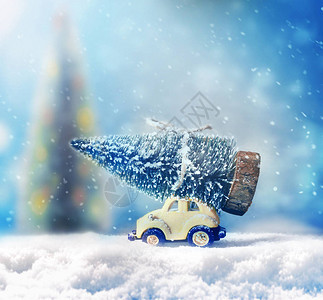玩具车上的圣诞树圣诞节庆祝活动的概图片