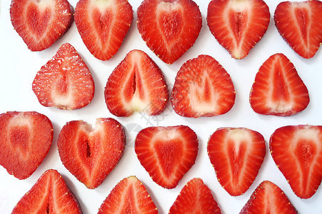 草莓片红色背景纹理顶尖视野夏季生图片